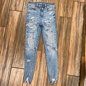American Eagle next level stretch distressed super high rise jeggings size 4